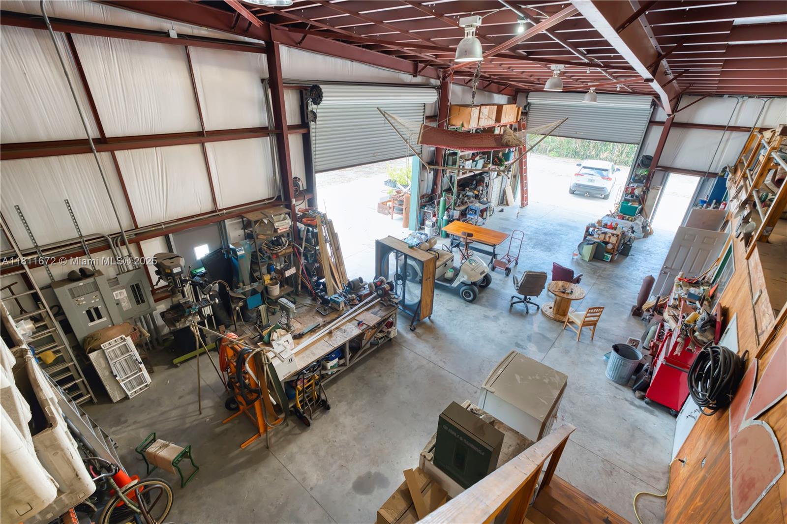 4077 Southwest 121st Terrace Davie, FL 33330 - Photo 31 of 85 a living room with lots of furniture and a window
