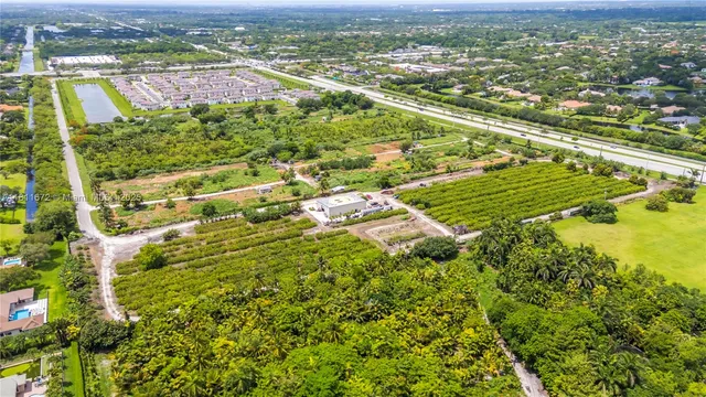 an aerial view of a house with a garden