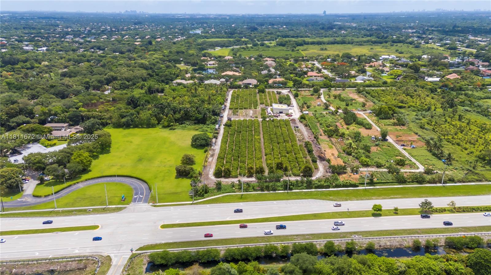 4077 Southwest 121st Terrace Davie, FL 33330 - Photo 5 of 85 an aerial view of multiple house with a yard