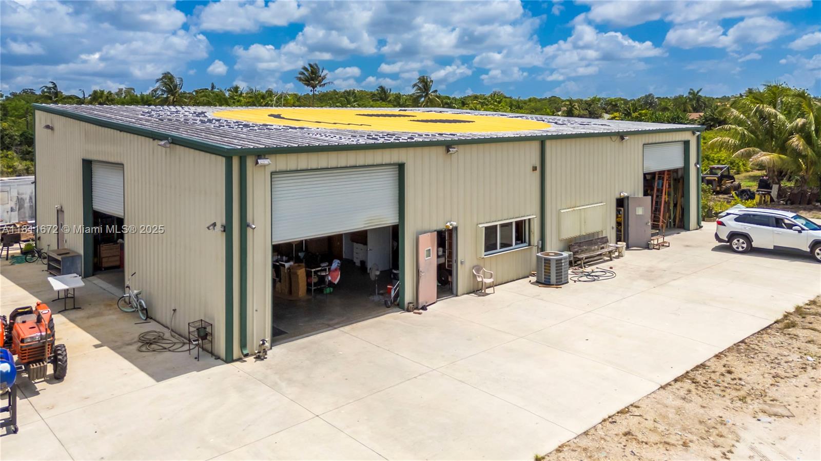 4077 Southwest 121st Terrace Davie, FL 33330 - Photo 6 of 85 a view of a house with a patio