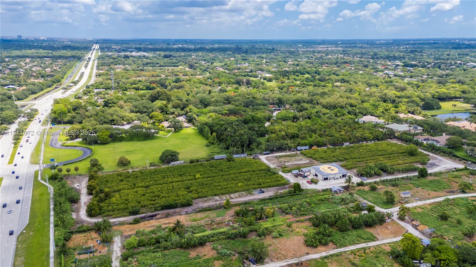 4077 Southwest 121st Terrace Davie, FL 33330 - Photo 70 of 85 an aerial view of a residential houses with outdoor space and trees