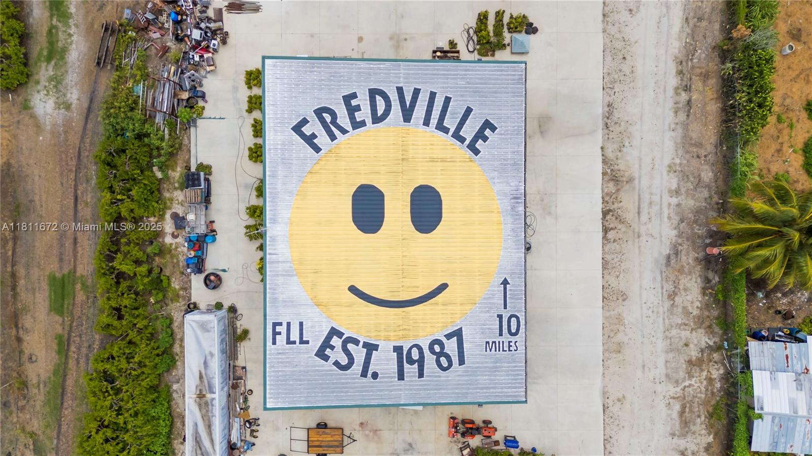 4077 Southwest 121st Terrace Davie, FL 33330 - Photo 7 of 85 a sign that is on the wall of a building