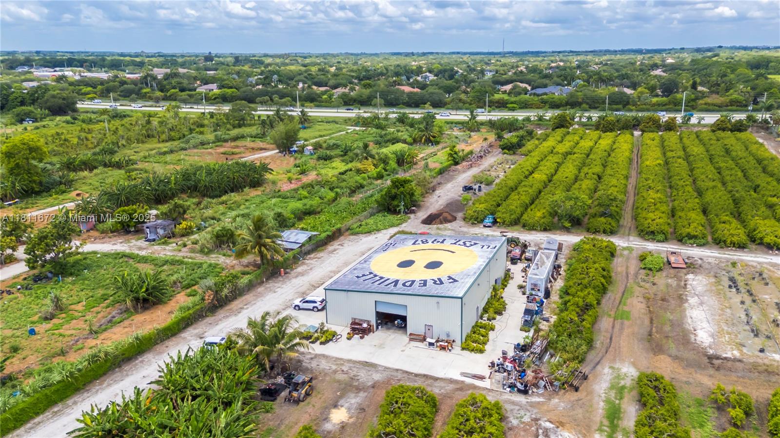 4077 Southwest 121st Terrace Davie, FL 33330 - Photo 84 of 85 an aerial view of residential houses with outdoor space and street view