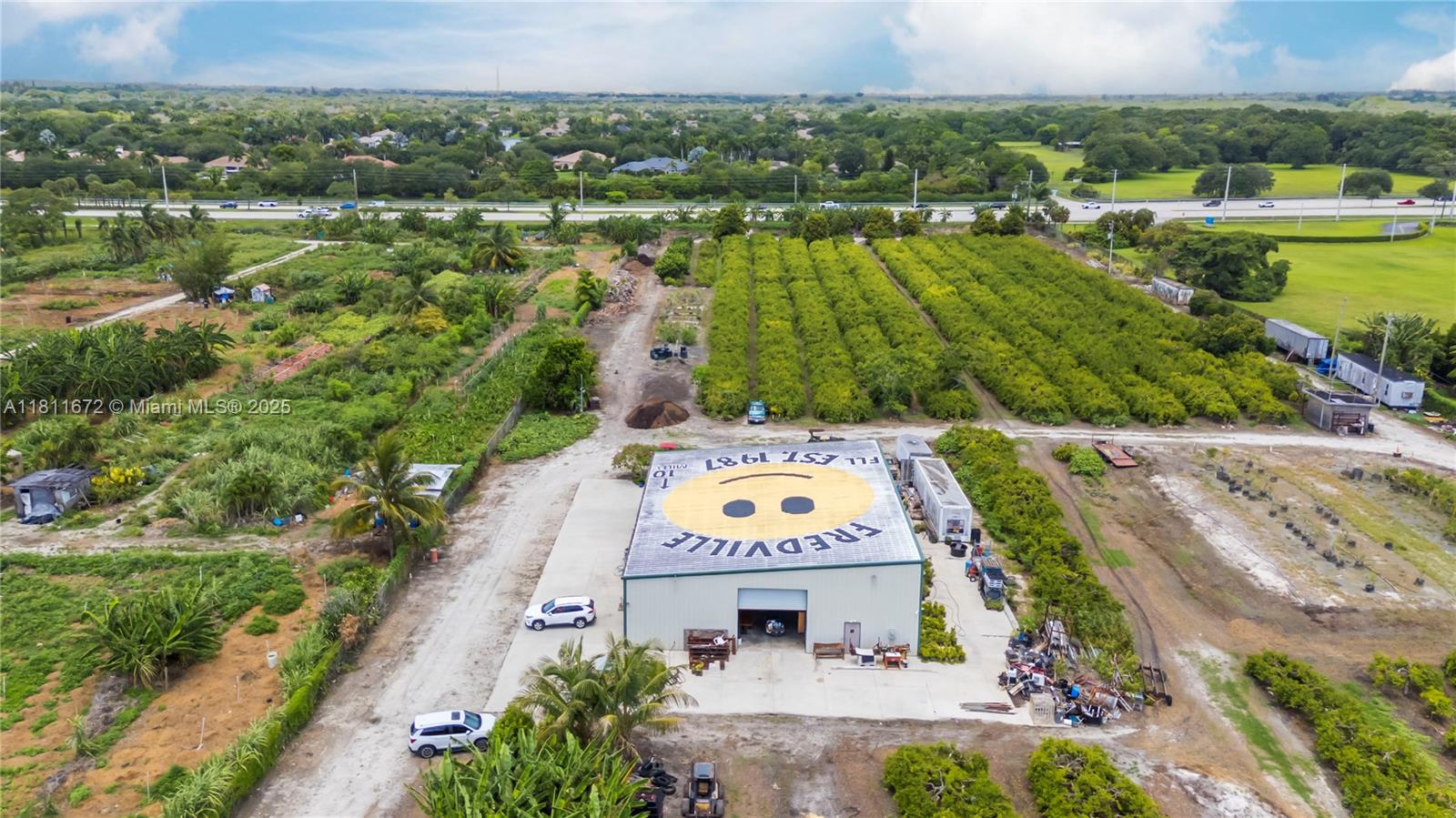 4077 Southwest 121st Terrace Davie, FL 33330 - Photo 85 of 85 an aerial view of residential houses with outdoor space and river