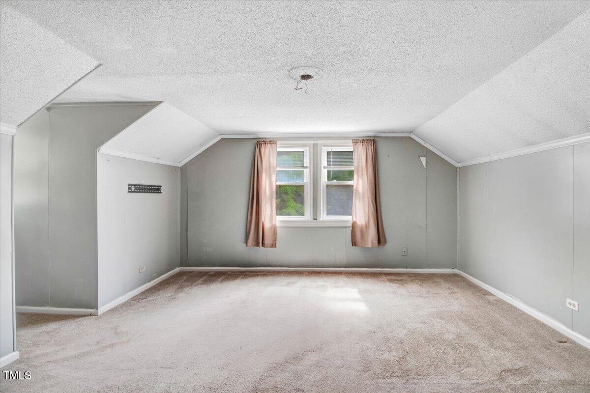 607 East Geer Street Durham, NC 27701 - Photo 14 of 23 an empty room with windows