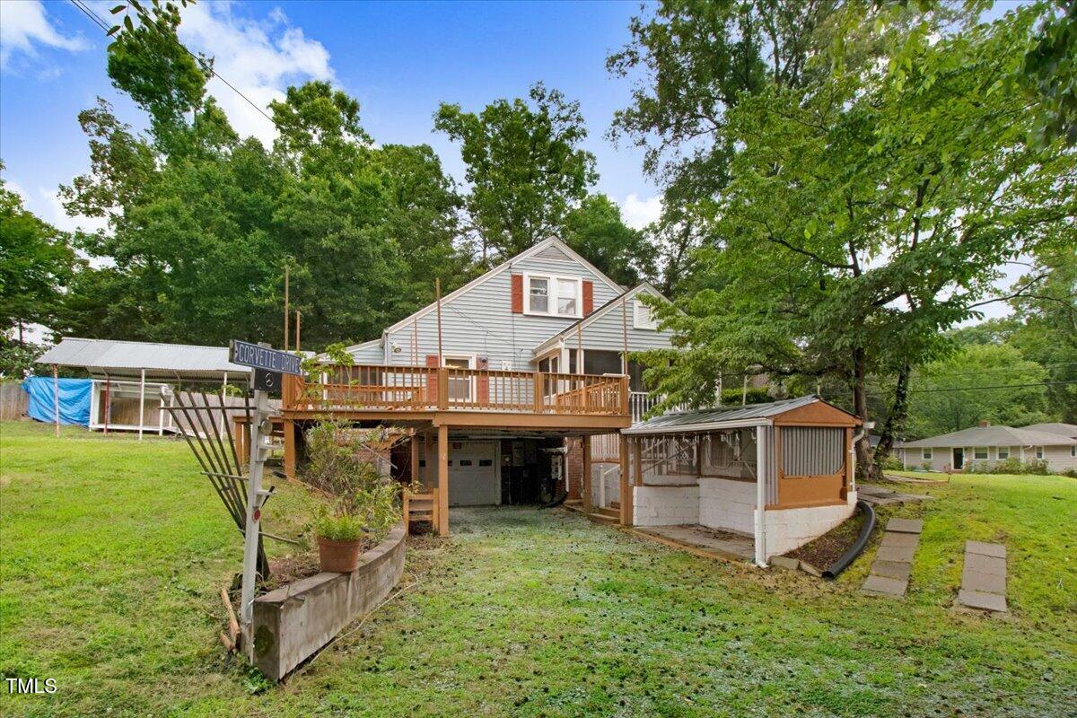607 East Geer Street Durham, NC 27701 - Photo 4 of 23 an aerial view of a house with swimming pool next to a big yard