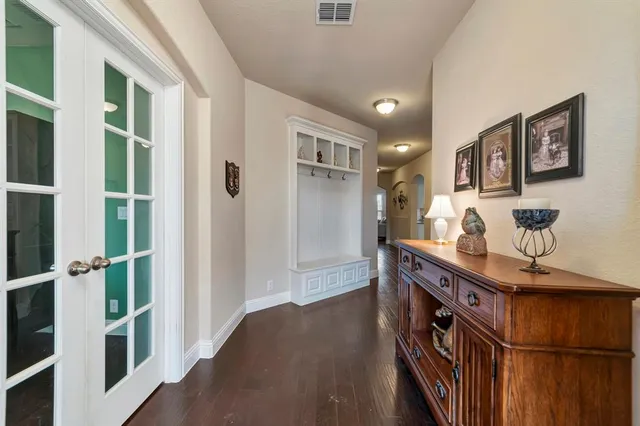 a view of kitchen with furniture and wooden floor