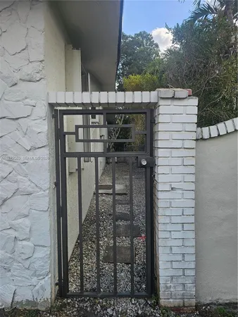 a view of a house with a yard and garage