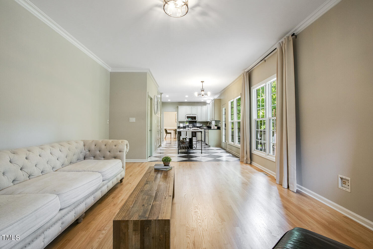 106 Tawny Ridge Lane Cary, NC 27513 - Photo 10 of 19 a living room with furniture and a large window