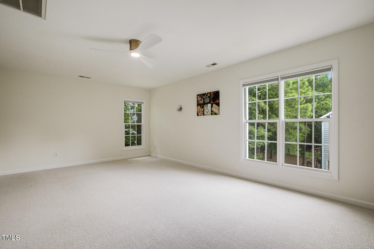 106 Tawny Ridge Lane Cary, NC 27513 - Photo 16 of 19 an empty room with windows