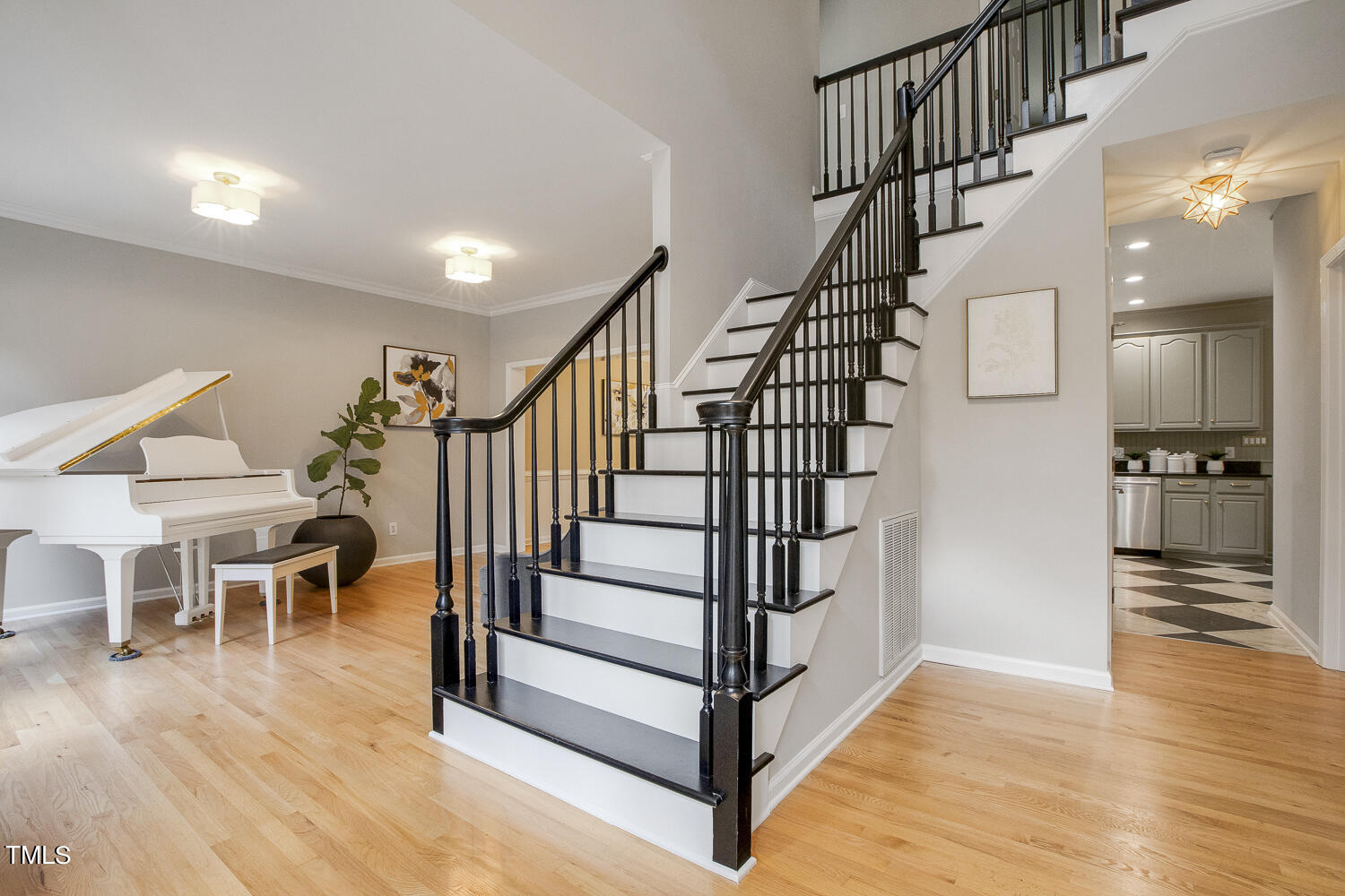 106 Tawny Ridge Lane Cary, NC 27513 - Photo 2 of 19 a view of entryway and hall with wooden floor