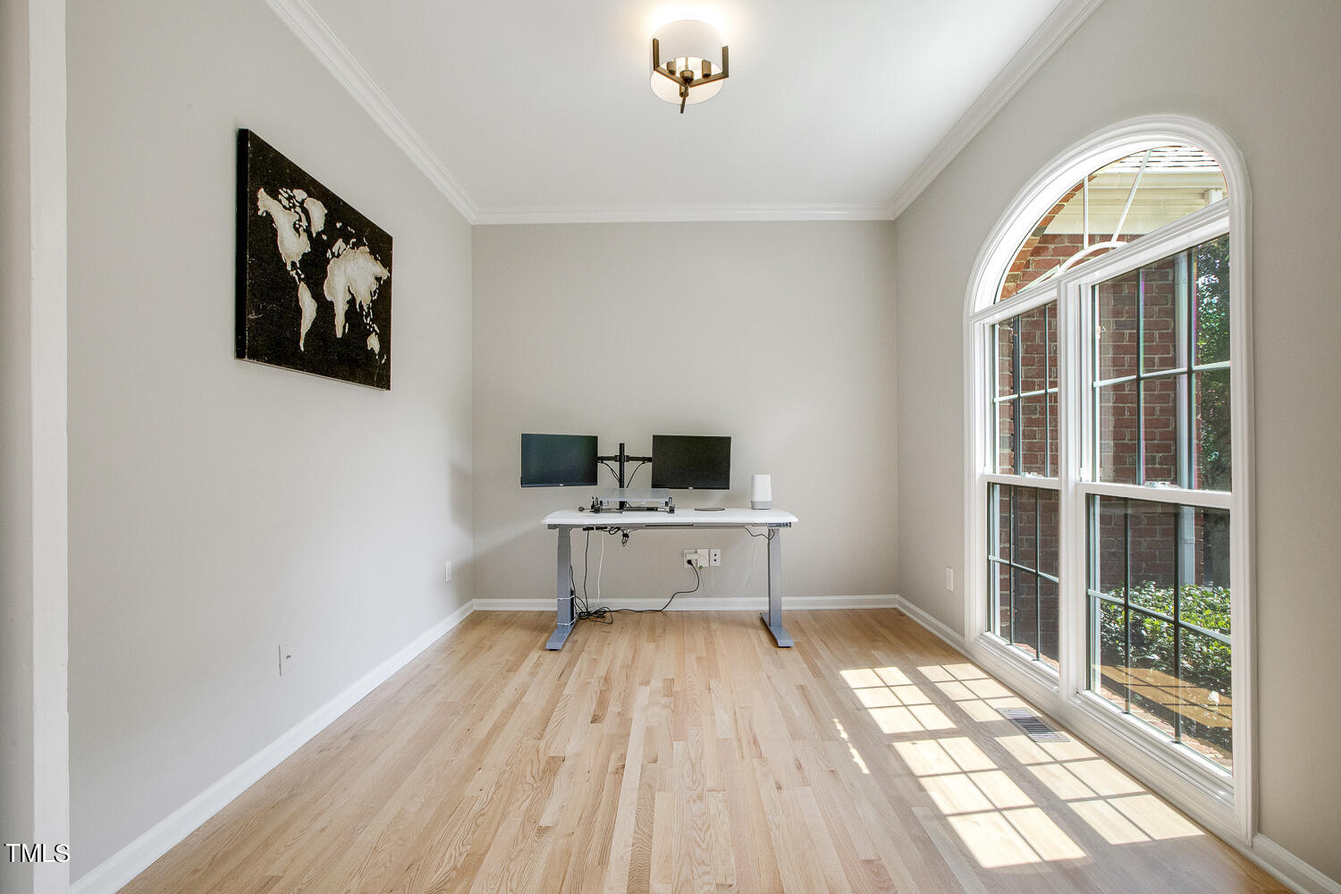 106 Tawny Ridge Lane Cary, NC 27513 - Photo 4 of 19 a room with a bed and a window
