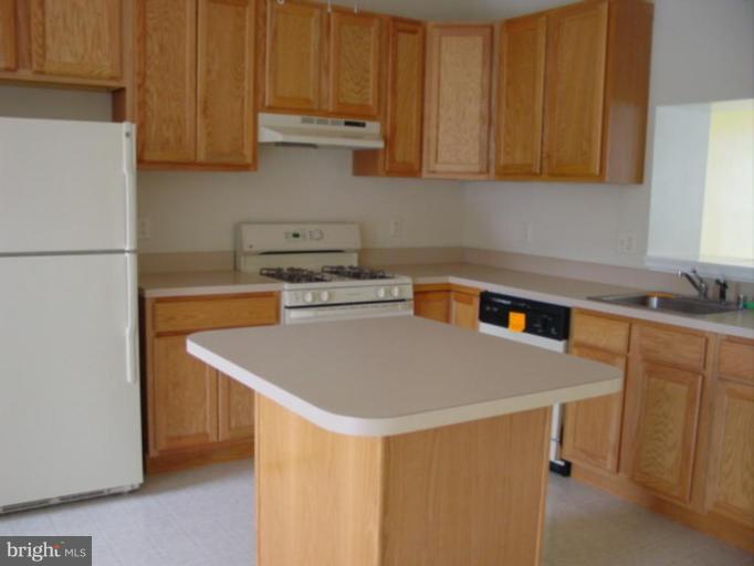 1531 Rambling Way South Frederick, MD 21701 - Photo 3 of 9 Spacious kitchen with a gas stove and oven.
