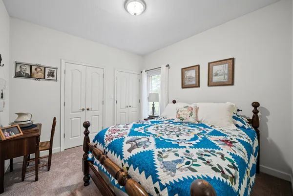 a view of entryway with furniture and wooden floor