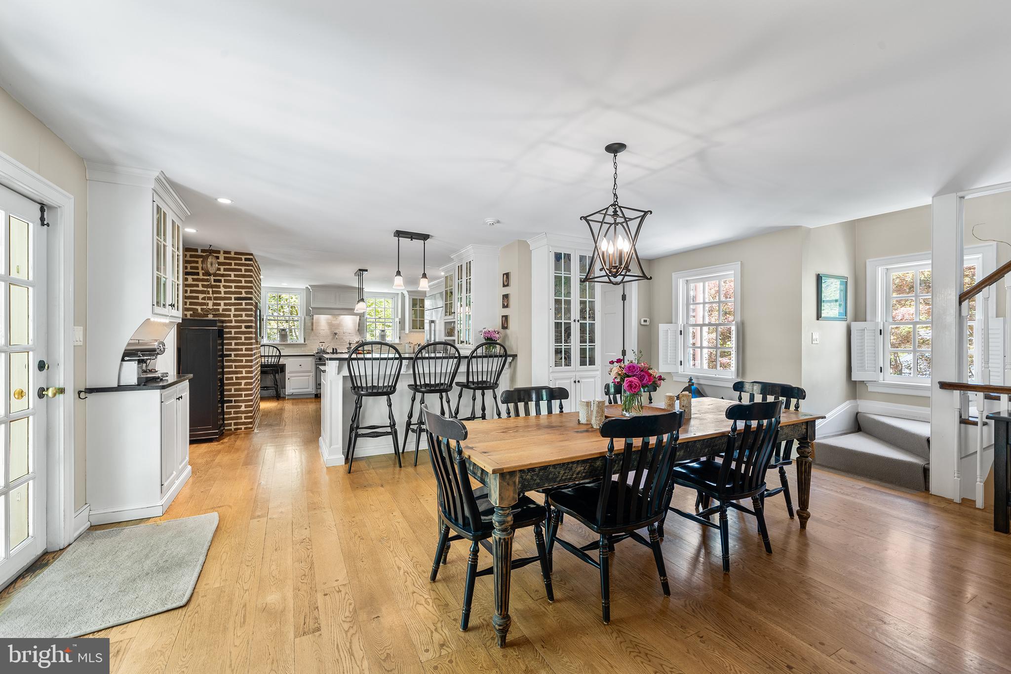 311 Millbank Road Bryn Mawr, PA 19010 - Photo 15 of 54 a view of a dining room with furniture and wooden floor