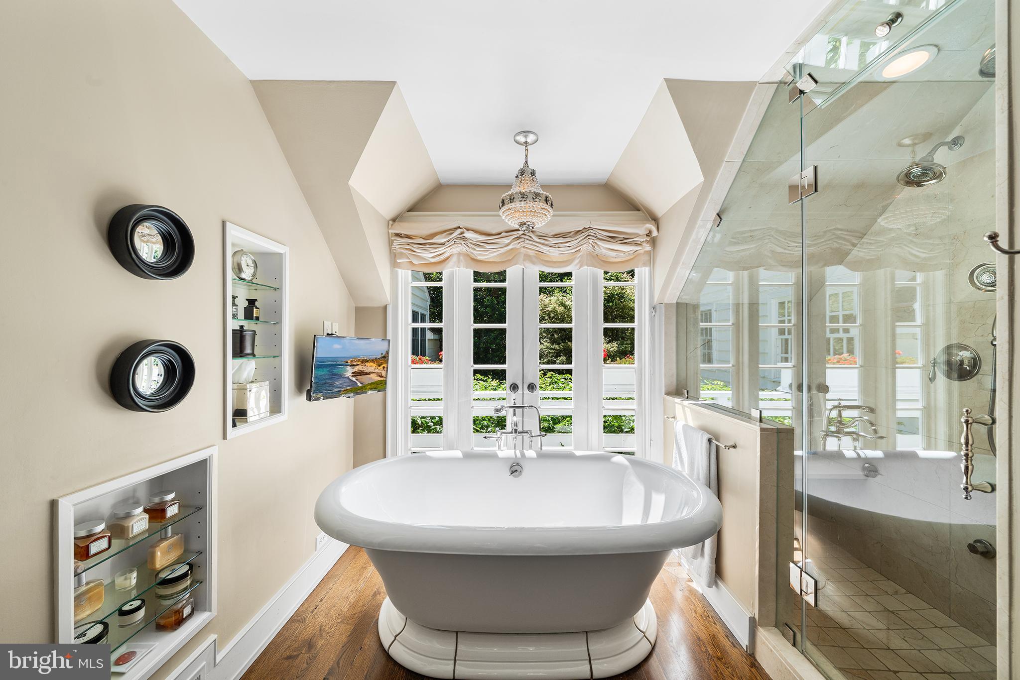 311 Millbank Road Bryn Mawr, PA 19010 - Photo 23 of 54 a spacious bathroom with a sink and a large mirror