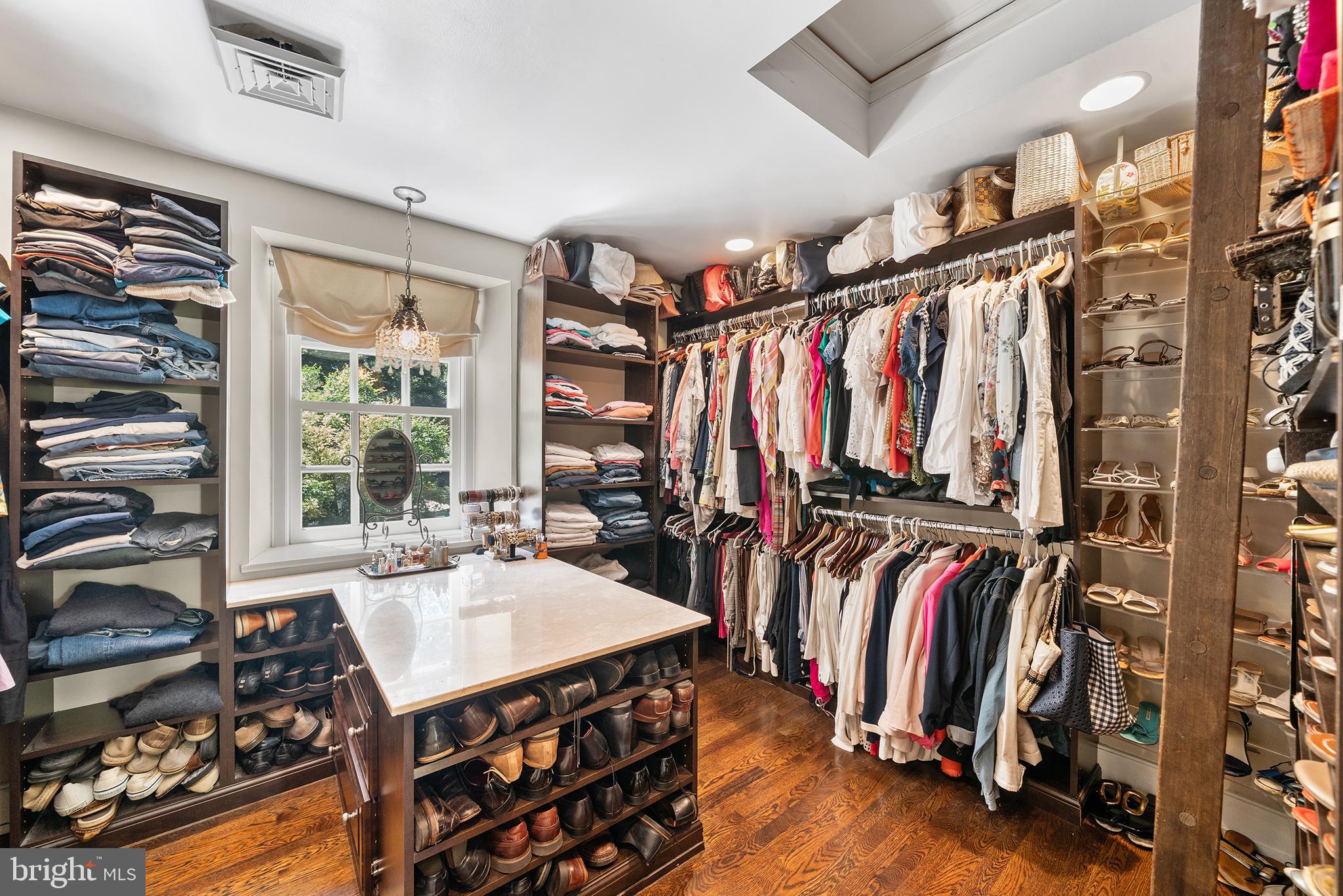 311 Millbank Road Bryn Mawr, PA 19010 - Photo 24 of 54 a view of walk in closet with clothes and shoes