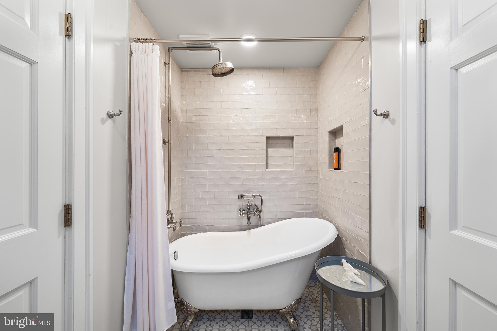 311 Millbank Road Bryn Mawr, PA 19010 - Photo 30 of 54 a white toilet sitting next to a bathroom sink