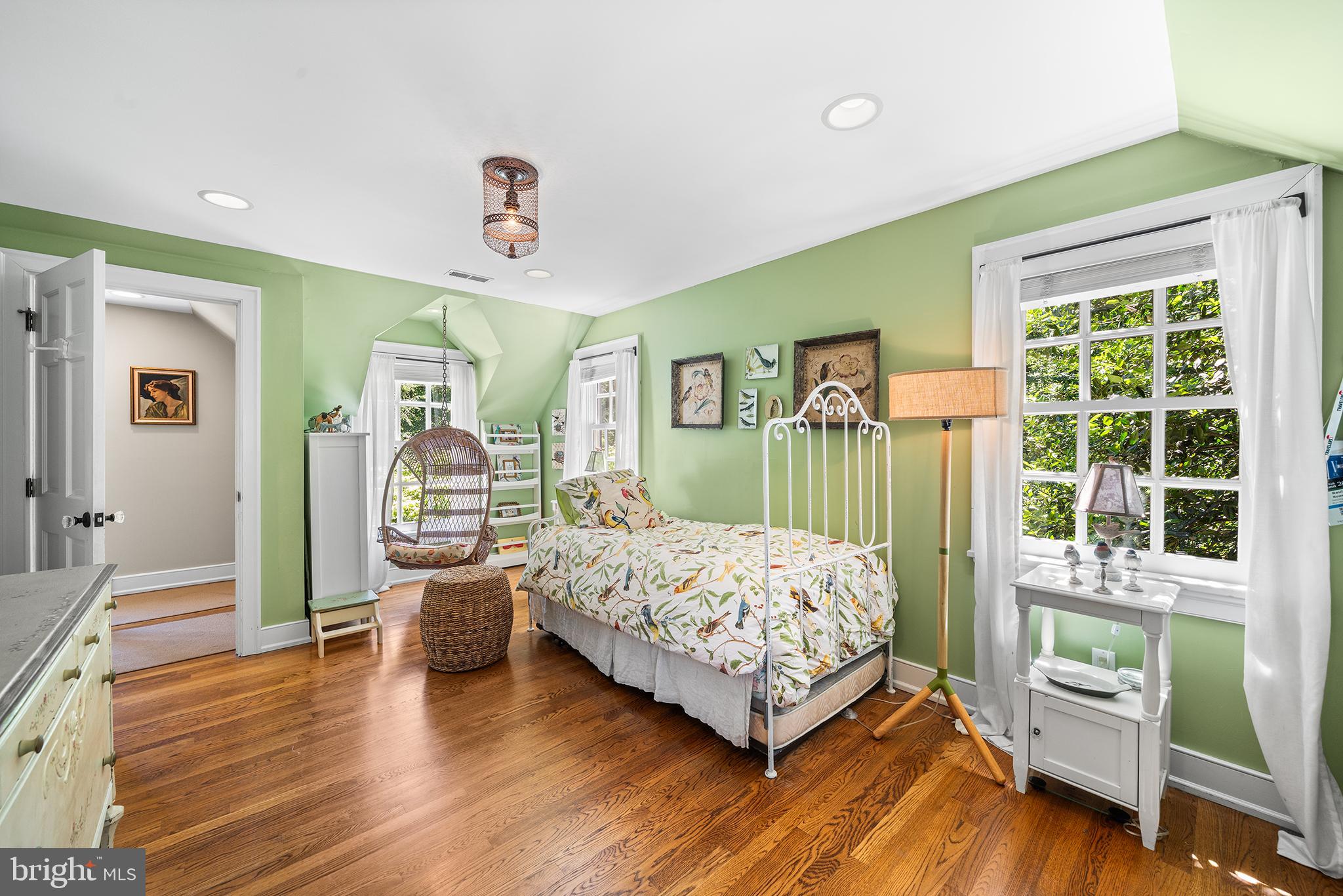 311 Millbank Road Bryn Mawr, PA 19010 - Photo 32 of 54 a bedroom with a bed and a wooden floor