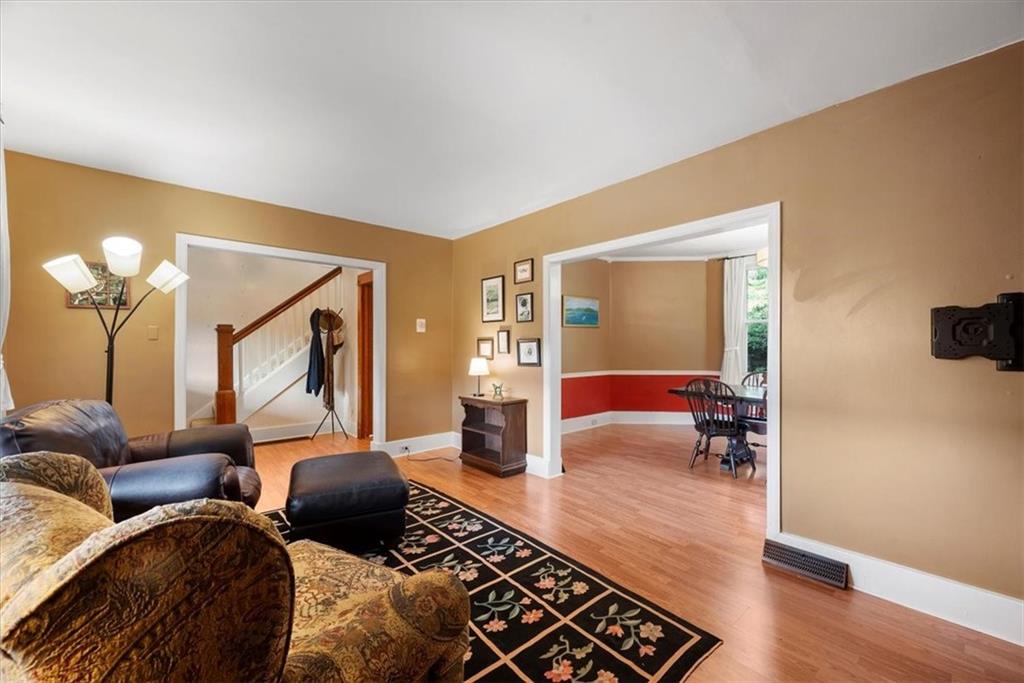 227 Elmore Road Pittsburgh, PA 15221 - Photo 11 of 50 a bedroom with furniture and a wooden floor