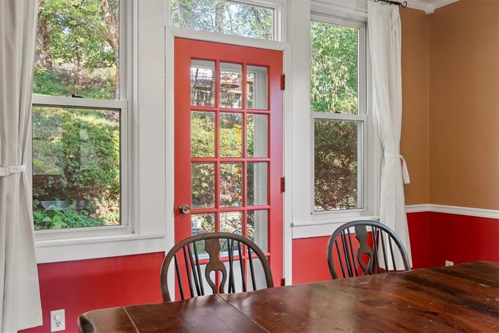 227 Elmore Road Pittsburgh, PA 15221 - Photo 15 of 50 a view of a dining room with furniture window and outside view