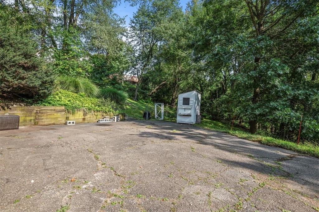 227 Elmore Road Pittsburgh, PA 15221 - Photo 40 of 50 a road view with large trees