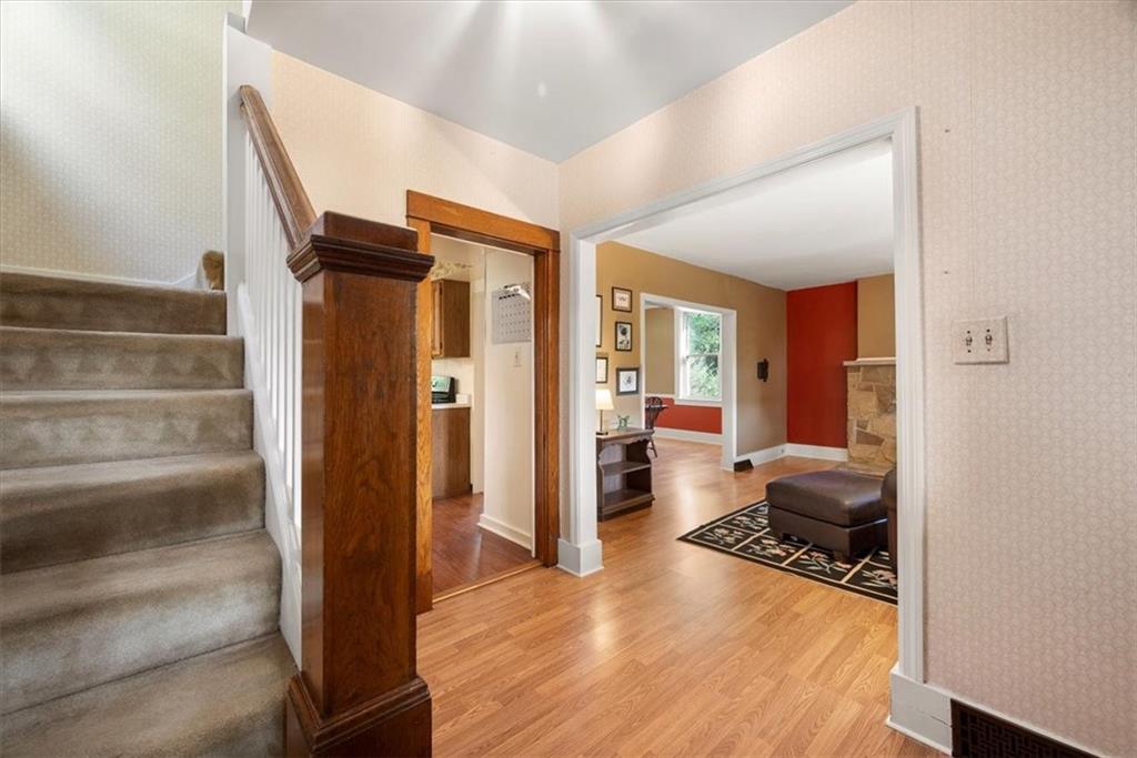 227 Elmore Road Pittsburgh, PA 15221 - Photo 8 of 50 a view of a livingroom with wooden floor and furniture
