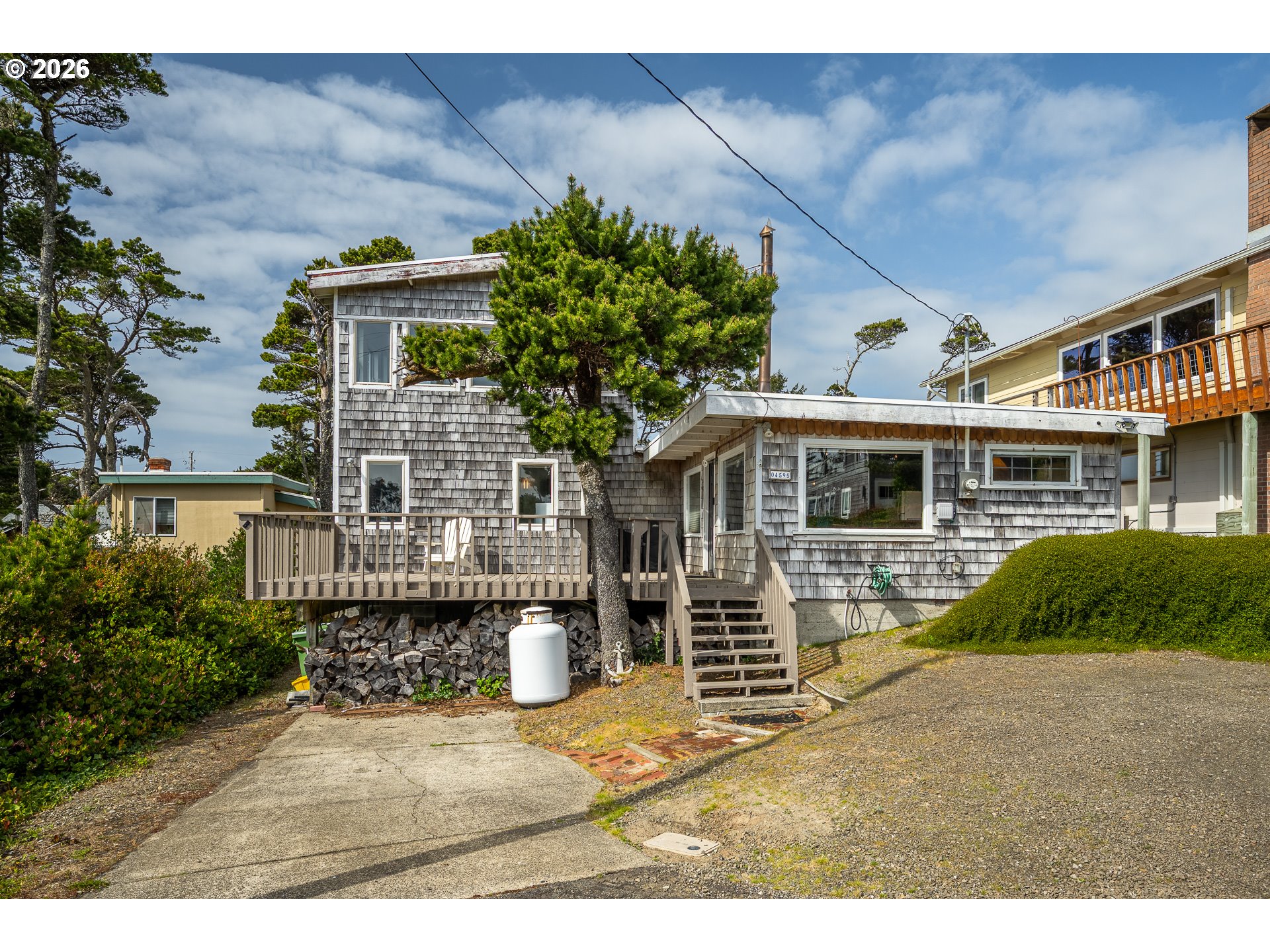 4595 Blanco Street Florence, OR 97439 - Photo 1 of 28 front view of a house with a porch