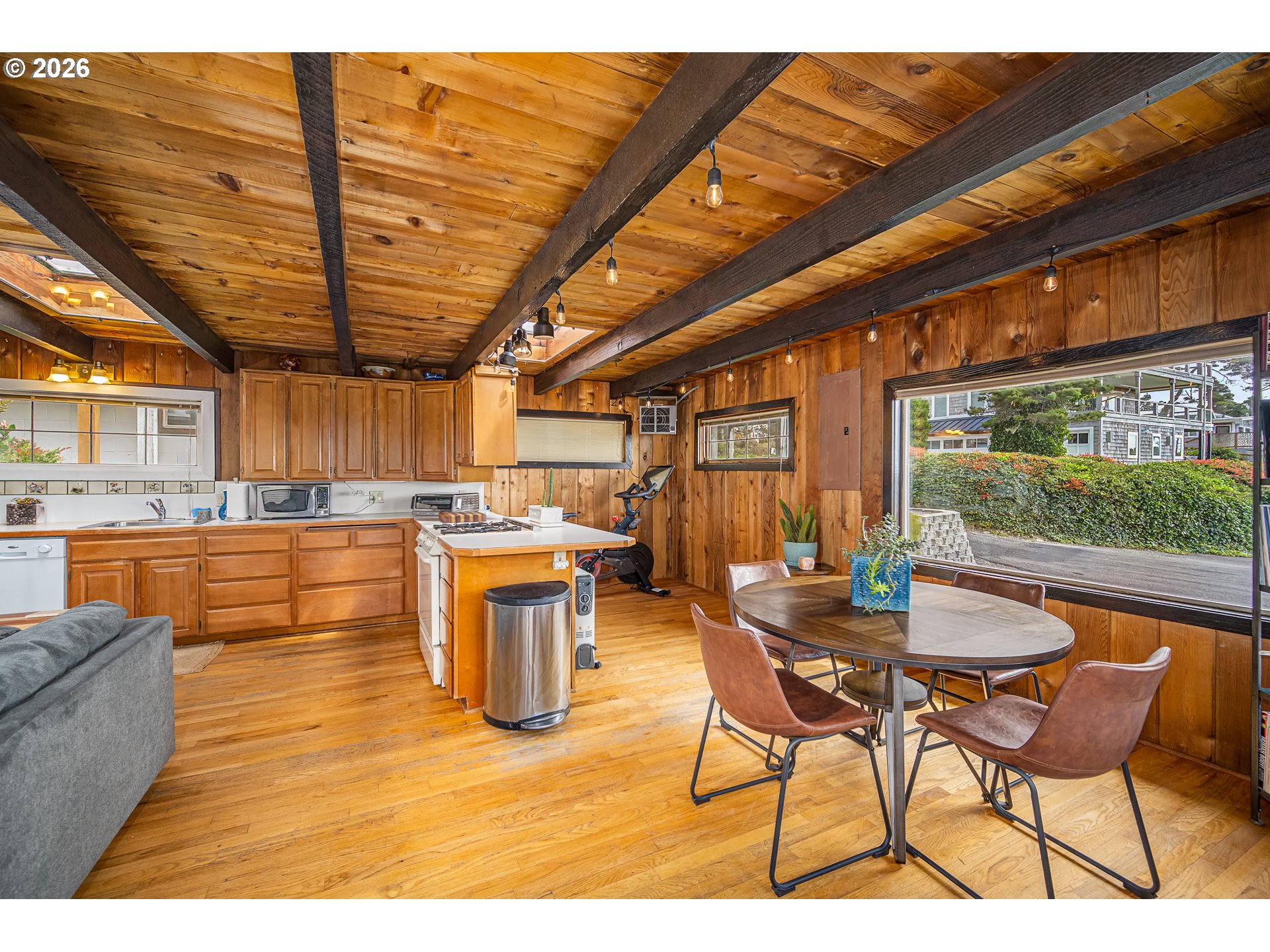 4595 Blanco Street Florence, OR 97439 - Photo 5 of 28 a outdoor dining space with furniture and garden view