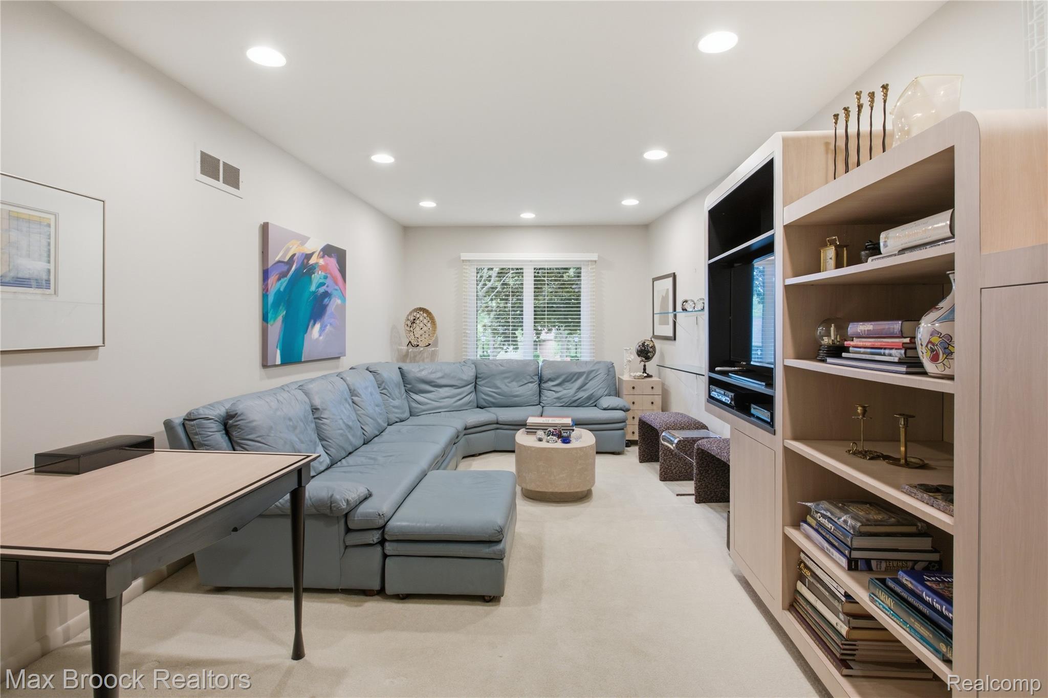 7163 Suncrest Road West Bloomfield, MI 48322 - Photo 23 of 40 Spacious room featuring built in's and glass shelving