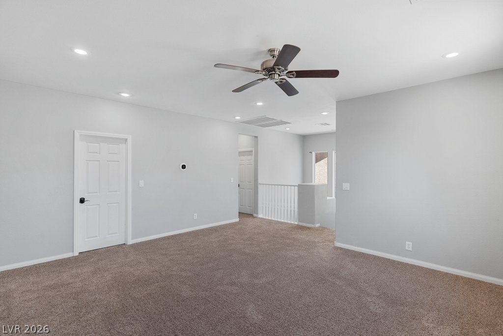 10336 Hawk Ravine Street Las Vegas, NV 89178 - Photo 23 of 59 Great space for an Entertainment Room.