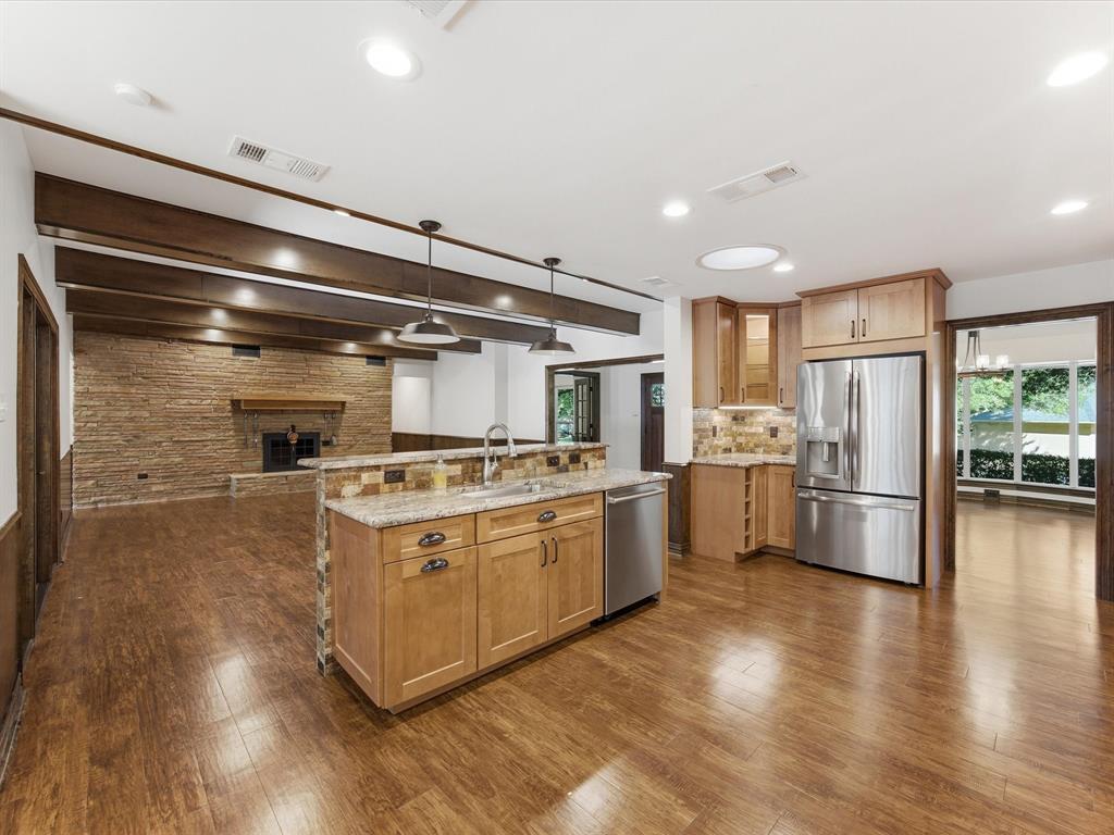 3717 Myrtle Springs Road Benbrook, TX 76116 - Photo 12 of 40 The center of the house is this gourmet kitchen totally remodeled for today's living.