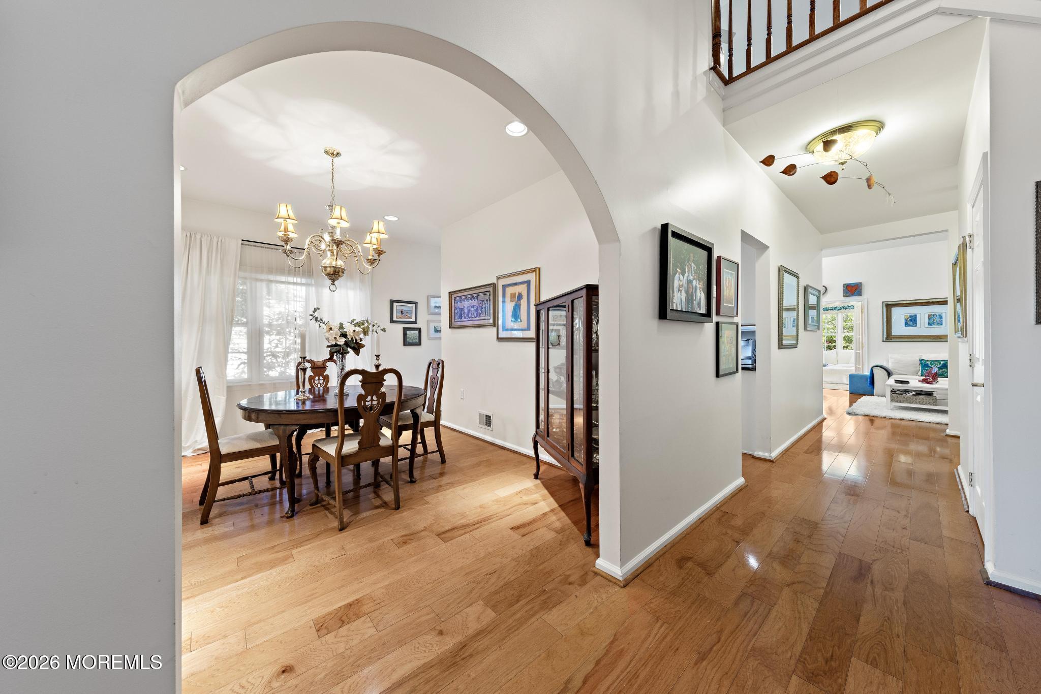 23 Congressional Road Jackson, NJ 08527 - Photo 11 of 65 a view of a dining room with furniture and wooden floor