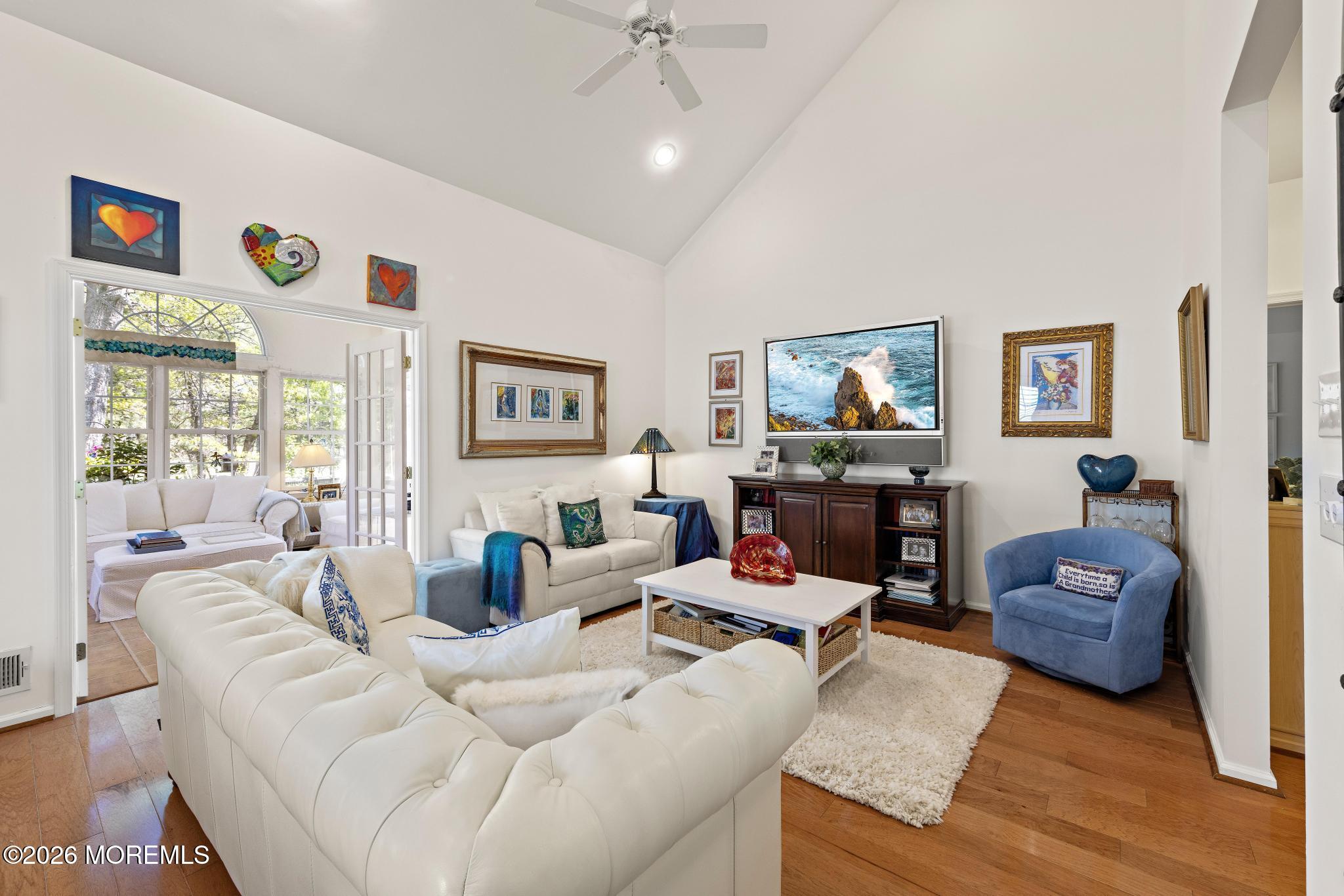 23 Congressional Road Jackson, NJ 08527 - Photo 14 of 65 a living room with furniture and a flat screen tv