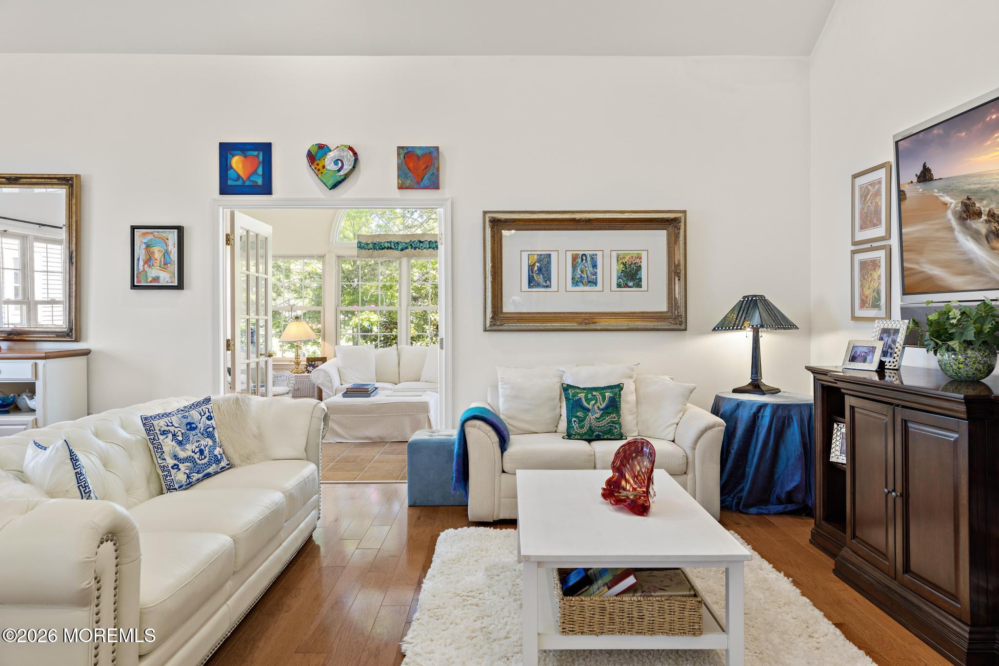 23 Congressional Road Jackson, NJ 08527 - Photo 15 of 65 a living room with furniture and a window