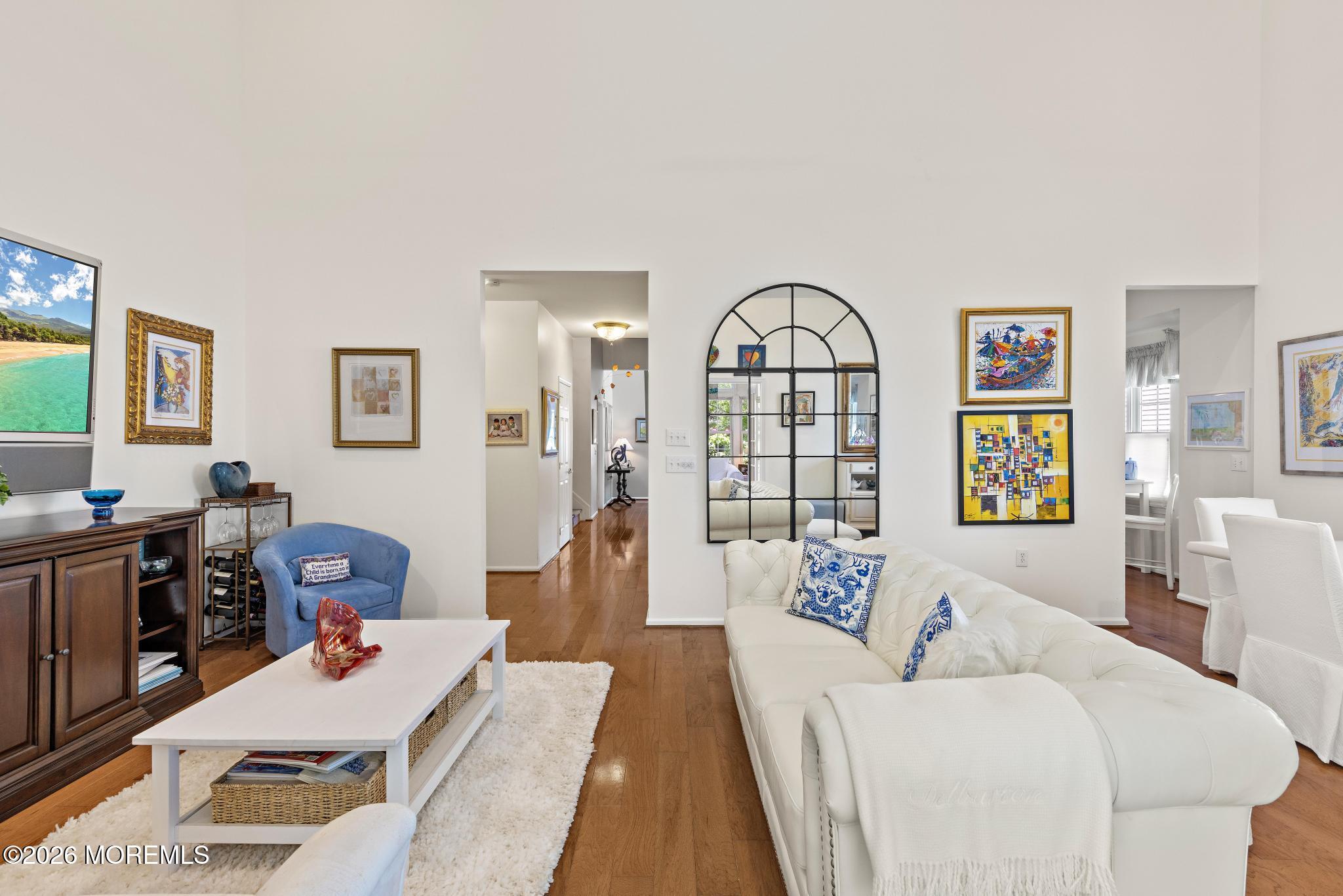 23 Congressional Road Jackson, NJ 08527 - Photo 19 of 65 a living room with furniture and a flat screen tv