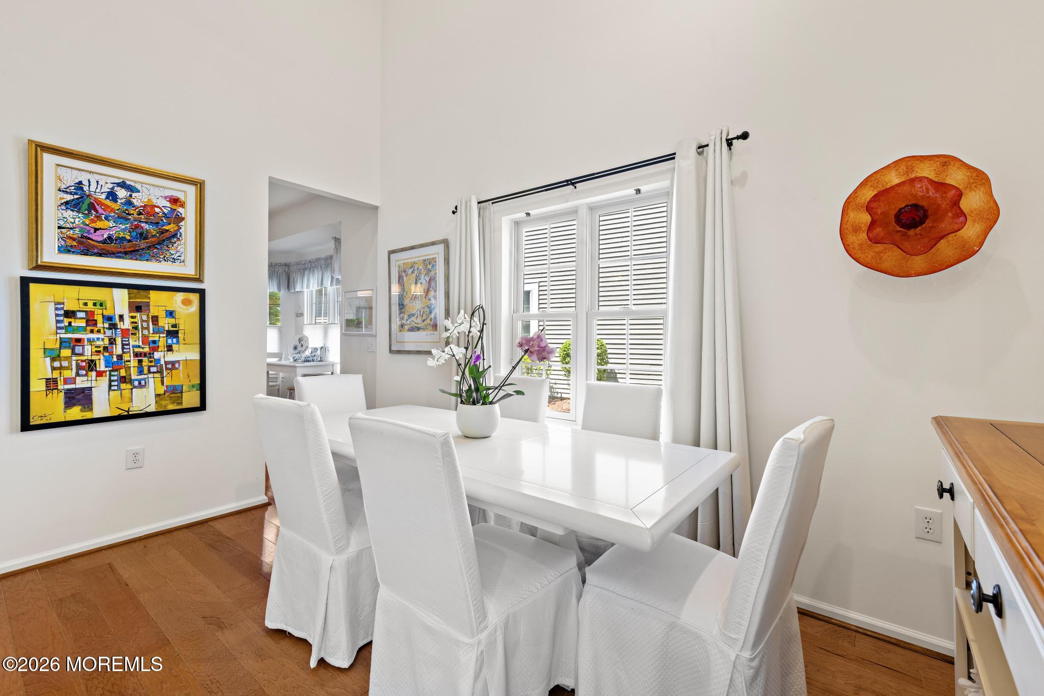 23 Congressional Road Jackson, NJ 08527 - Photo 20 of 65 a view of a dining room with furniture and wooden floor