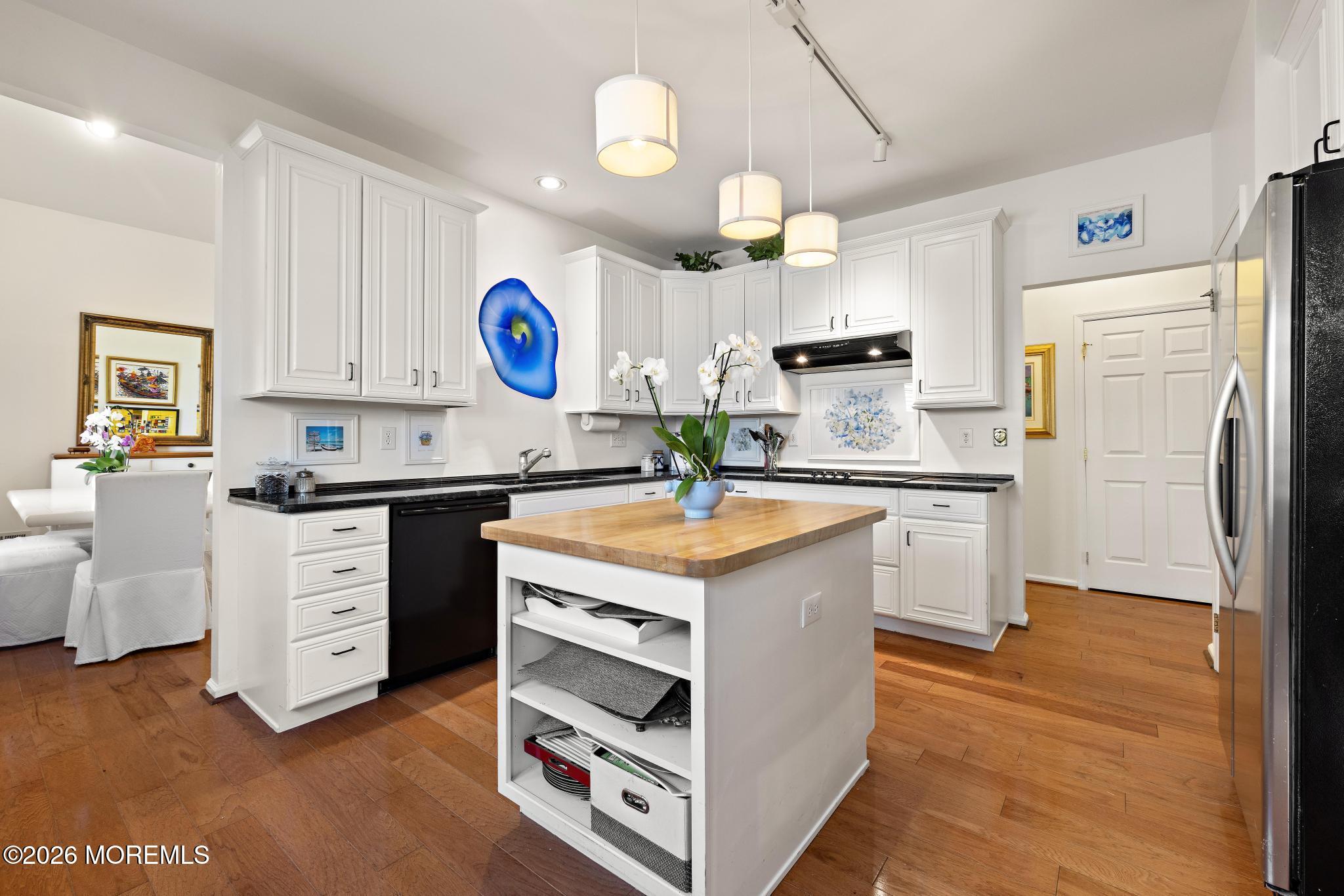 23 Congressional Road Jackson, NJ 08527 - Photo 23 of 65 a kitchen with stainless steel appliances granite countertop a stove a sink and a refrigerator