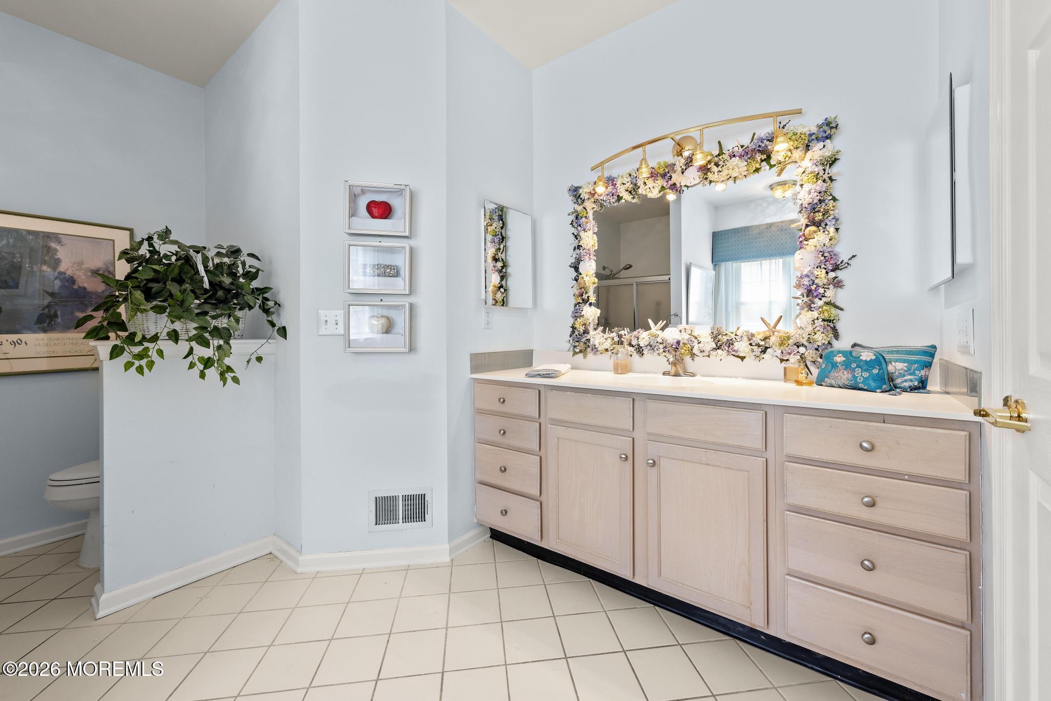 23 Congressional Road Jackson, NJ 08527 - Photo 31 of 65 a spacious bathroom with a sink mirror and vanity