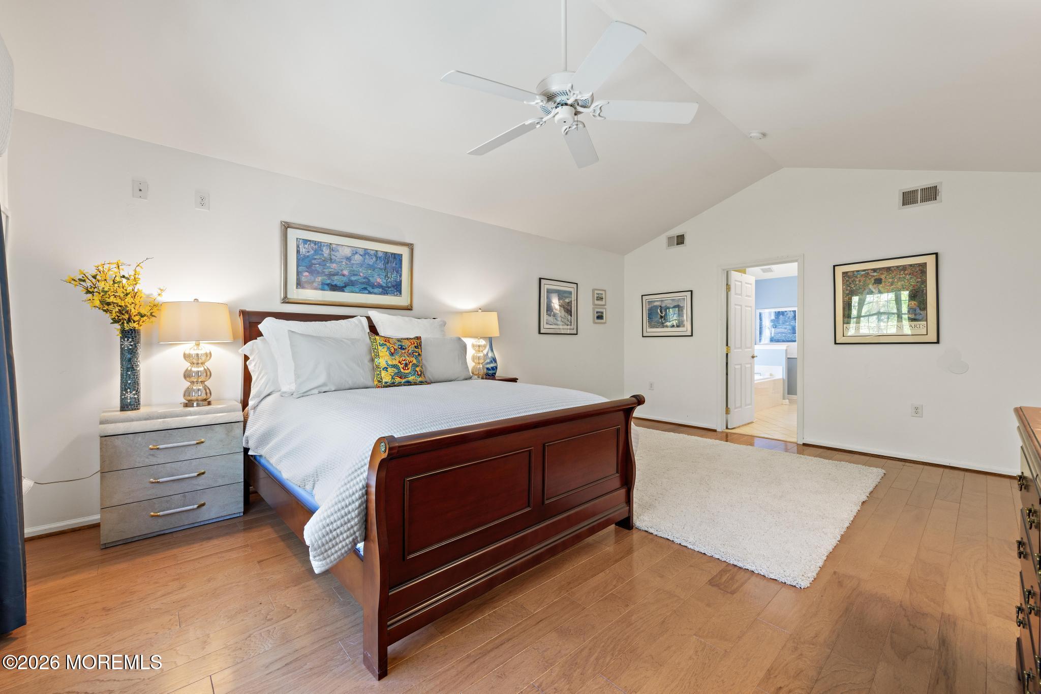23 Congressional Road Jackson, NJ 08527 - Photo 40 of 65 a spacious bedroom with a bed and a cabinets