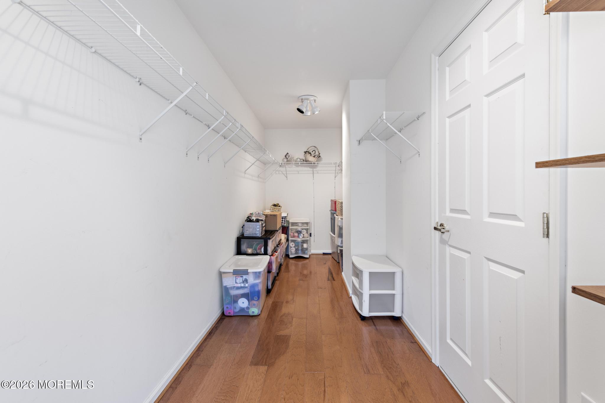 23 Congressional Road Jackson, NJ 08527 - Photo 41 of 65 a view of a hallway with wooden floor