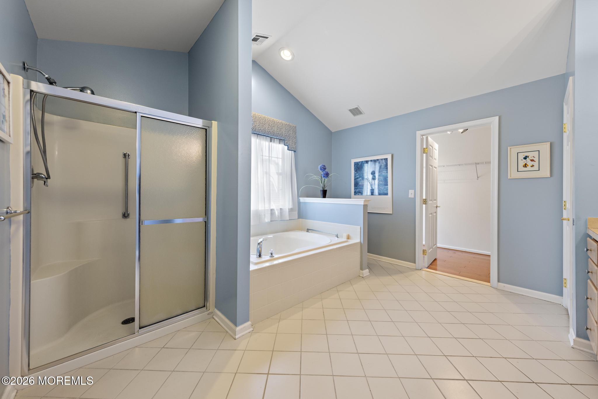 23 Congressional Road Jackson, NJ 08527 - Photo 43 of 65 a spacious bathroom with a bathtub and a shower