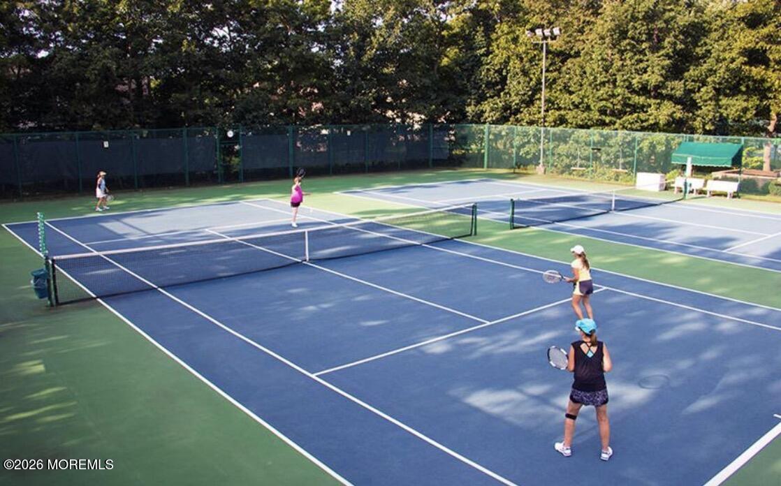 23 Congressional Road Jackson, NJ 08527 - Photo 57 of 65 a tennis court that has trees in the ground
