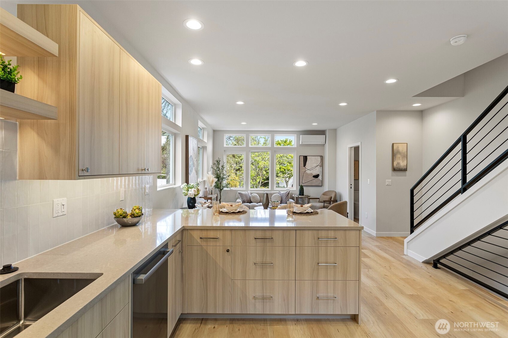 1127 Northwest 58th Street, Unit B Seattle, WA 98107 - Photo 13 of 30 a kitchen with a sink appliances and cabinets