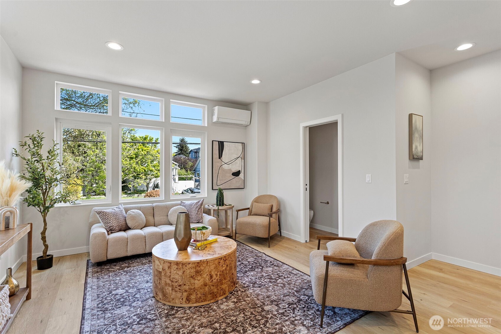 1127 Northwest 58th Street, Unit B Seattle, WA 98107 - Photo 16 of 30 a living room with furniture and a large window