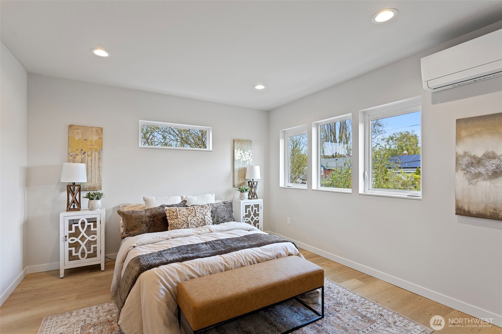 1127 Northwest 58th Street, Unit B Seattle, WA 98107 - Photo 22 of 30 a bedroom with a bed and a window