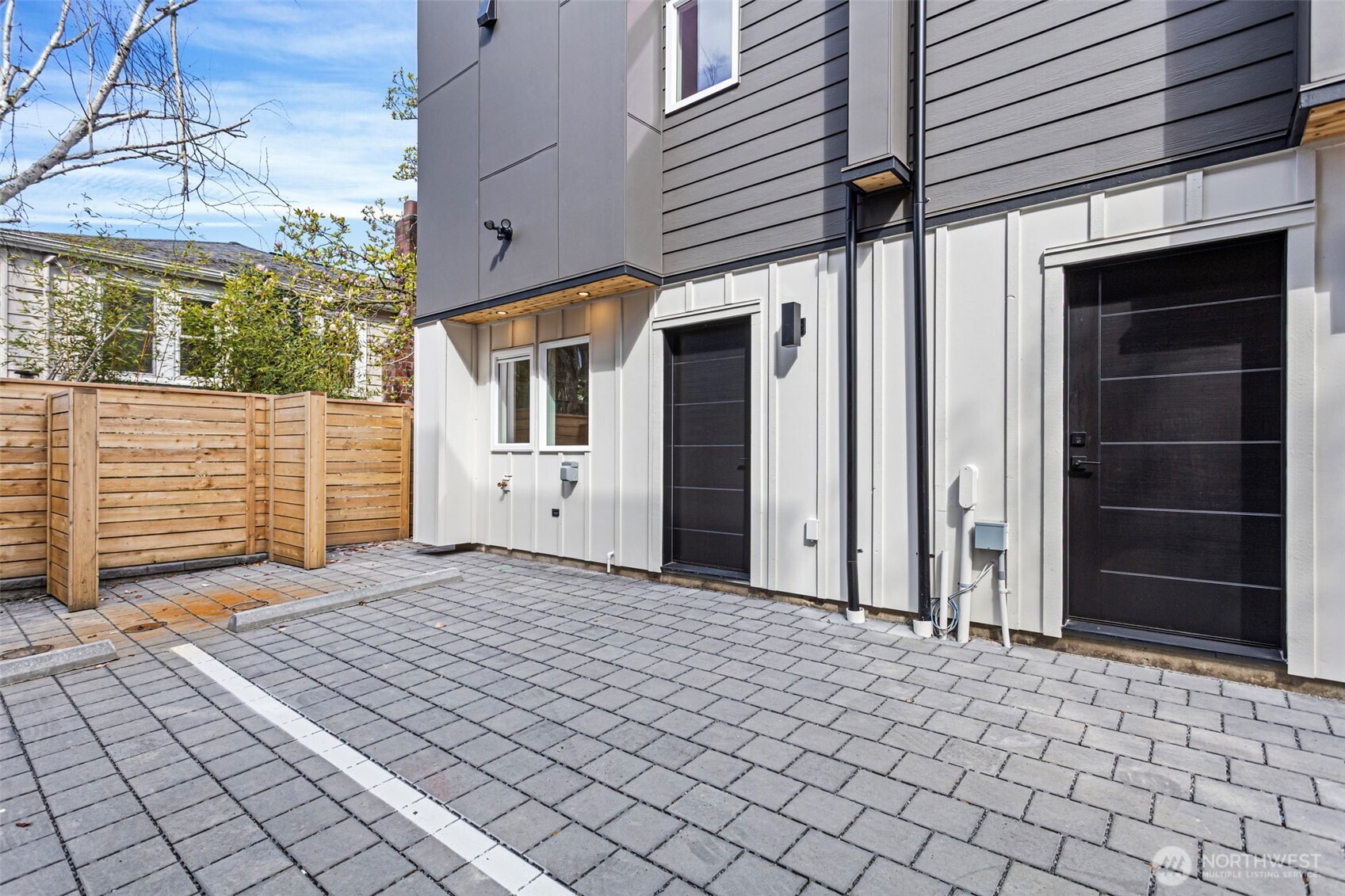 1127 Northwest 58th Street, Unit B Seattle, WA 98107 - Photo 30 of 30 a view of house with backyard