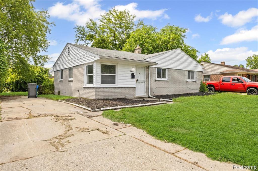 3930 Bayhan Street Inkster, MI 48141 - Photo 2 of 14 Single-story residence featuring a combination of light gray brick and horizontal white siding