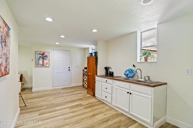 a bed room with a bed and a window