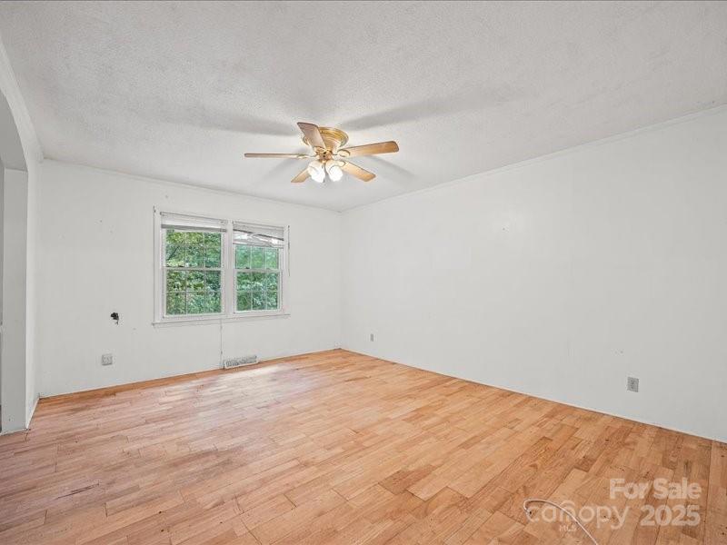 290 South Grandview Road Clover, SC 29710 - Photo 13 of 21 an empty room with a window and a fan